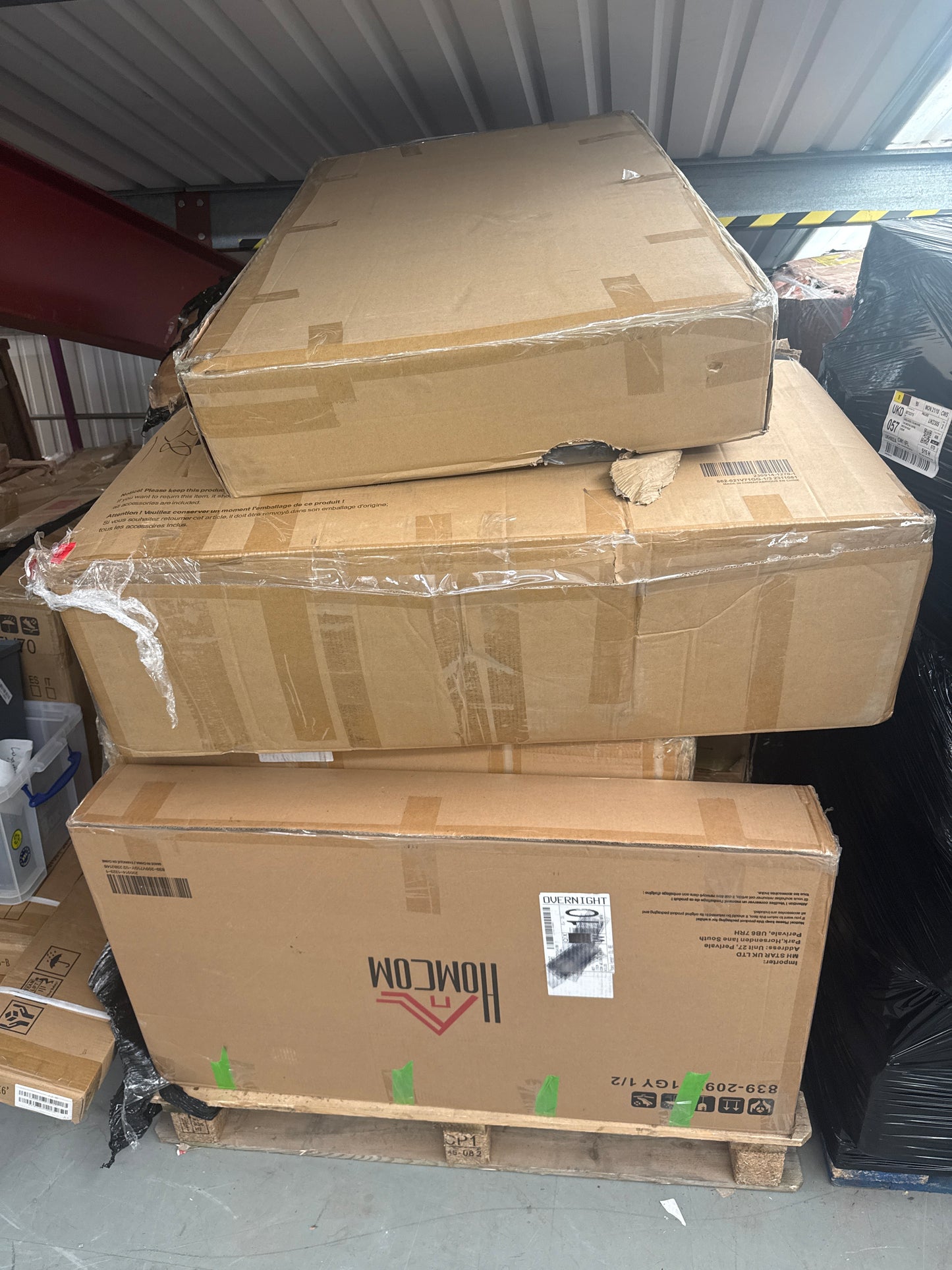 Pallet of unchecked furniture boxes